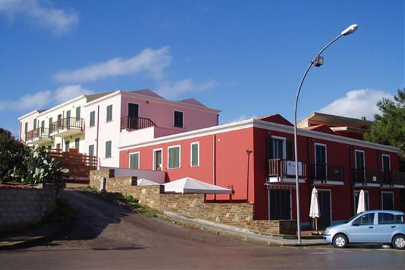 Realizzazione complesso immobiliare sito in Piazza dei 45, di n° 22 appartamenti, 22 garage, 5 uffici e 5 negozi commerciali - Stintino (SS).